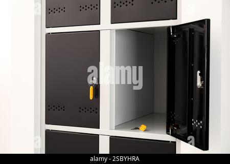 Modern lockers with bright keys indoors, closeup Stock Photo