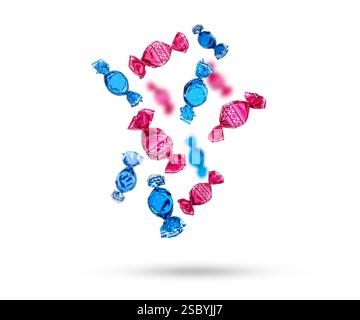Candies in bright wrappers falling on white background Stock Photo