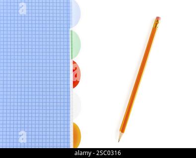 Checked notebook and pencil over white background Stock Photo