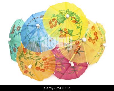Multicolored cocktail umbrellas against the white background Stock Photo