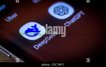 London. UK- 02.02.2025. Macro close up of the DeepSeek and Chat GPT app icons on the screen of a mobile phone. Stock Photo