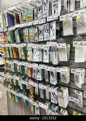 Kyiv, Ukraine - February 04, 2025: Organized collection of USB cables for sale in retail store, offering different options Stock Photo
