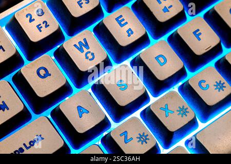 Dark blue rgb keyboard. WASD keyboard button Stock Photo