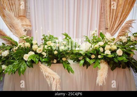 Wedding table setting in rustic style. decorated flowers Stock Photo