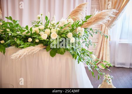 Wedding table setting in rustic style. decorated flowers Stock Photo