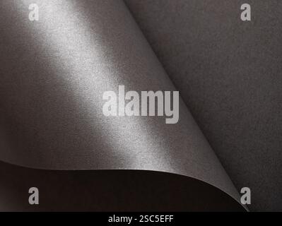 Graphite-textured paper background with a smooth, monochrome surface, subtle gradient, and elegant satin finish, perfect for artistic, modern, and pre Stock Photo