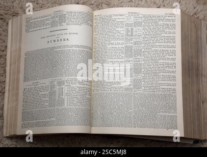 Open Bible showing Text of  Numbers (The Fourth Book of Moses) Old Testament in  Antique 19th Century The Illustrated National Family Bible with the C Stock Photo