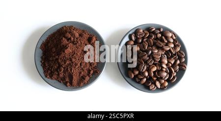 Coffee beans and ground coffee isolated on white background. Copy space. Overhead view. Stock Photo