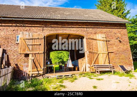 Exterior view of rustic old farm house barn on sunny summer day, Milecice village, Lower Silesia, Poland Stock Photo