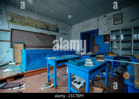 Ruined classroom in abandoned school. Stock Photo