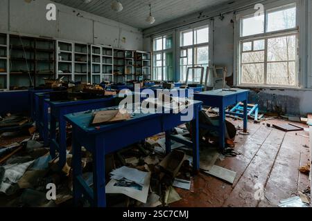 Ruined classroom in abandoned school. Stock Photo