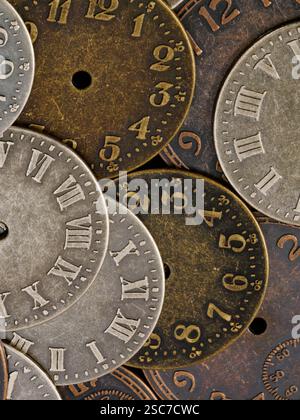 Close-up photo of vintage watch faces, some with Roman numerals Stock Photo