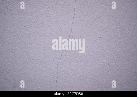 Cracked white wall background. Stock Photo