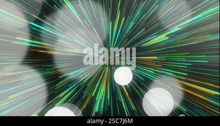 Colorful light streaks radiating outward over abstract image background Stock Photo