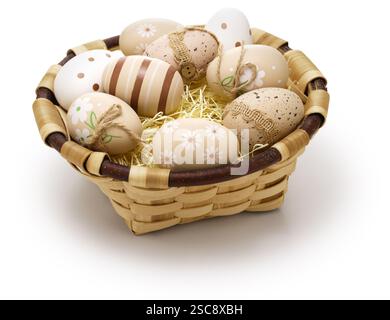 Simple, calm and coloring beautiful easter eggs in the basket. Greeting card design. Stock Photo