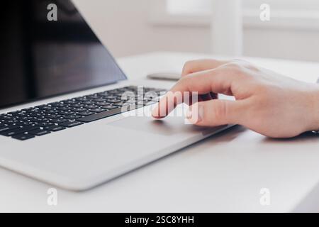 Young business person man working with notebook at workplace Stock Photo