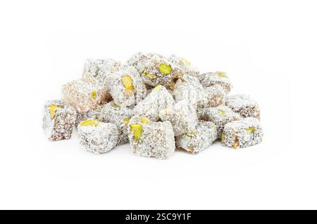 Turkish delight isolated on white background, traditional turkish sweet double roasted with pistachio nuts and coconut Stock Photo