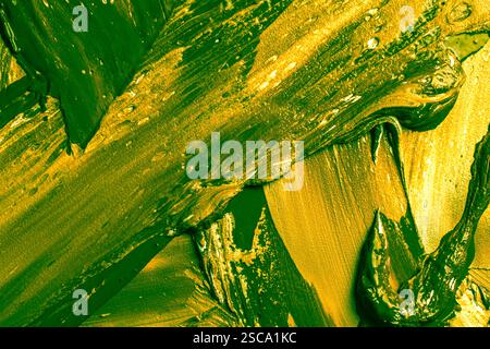 Abstract background with green and yellow plaster texture. Seamless background with large brush strokes. Rough stylized texture with space for text. H Stock Photo