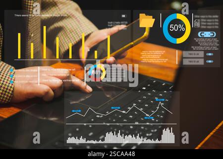 Analyst working on laptop with information database to analyze marketing sale data. Business project or program strategy planning and development for Stock Photo