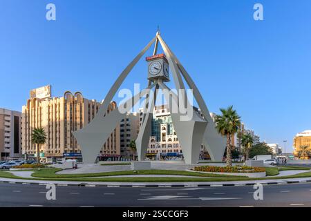 The well-known attraction Clock Tower Roundabout. Often a bottleneck for traffic travelling south over The Creek or north to Corniche or Sharjah. Stock Photo