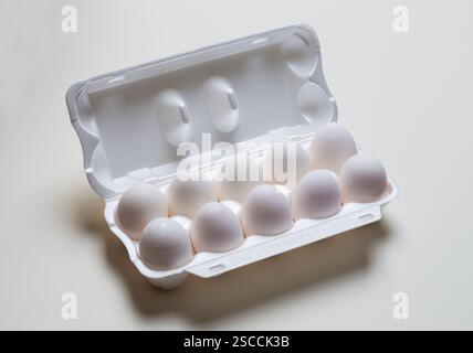 Chicken eggs in the cassette box on a white background Stock Photo - Alamy