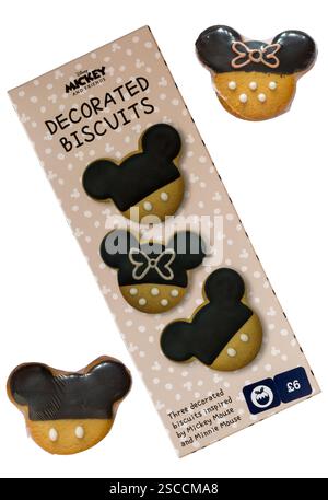 Disney Mickey and Friends Decorated Biscuits isolated on white background - three decorated biscuits inspired by Mickey Mouse and Minnie Mouse Stock Photo