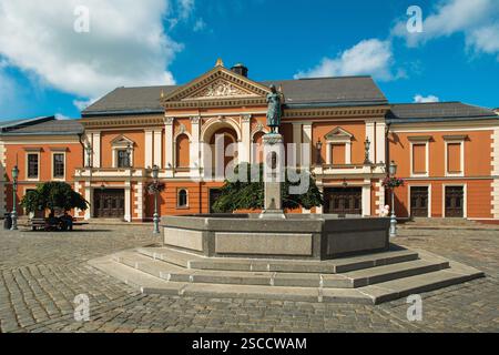 Monument to Simon Dach and Drama Theater Building in Klaipeda City Old Town Stock Photo