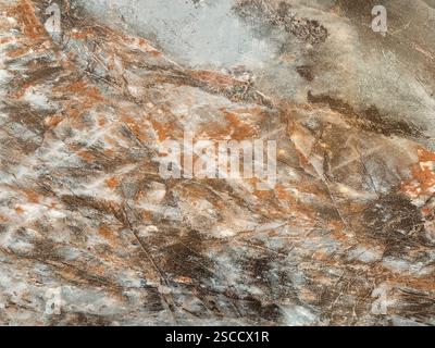 Natural light blue marble with dark golden red veins. Luxurious rare type blue natural marble stone, Seamless background texture. Stock Photo