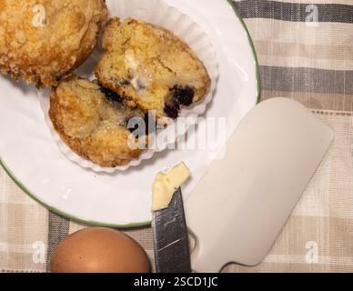 Beautiful blueberry muffin on white plate. Stock Photo