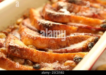 Freshly baked bread pudding in baking dish, closeup Stock Photo