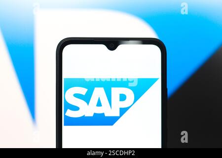 In this photo illustration, the SAP SE logo is seen displayed on a smartphone screen. Stock Photo