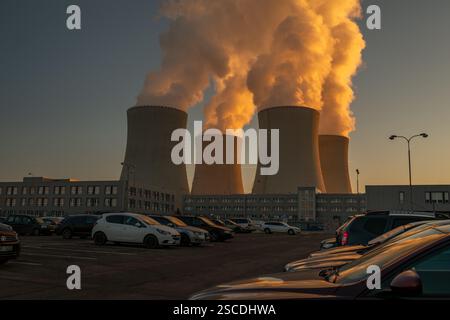 Big chimneys with white smoke in winter sunny day near nuclear power plant in Temelin CZ 02 04 2025 Stock Photo