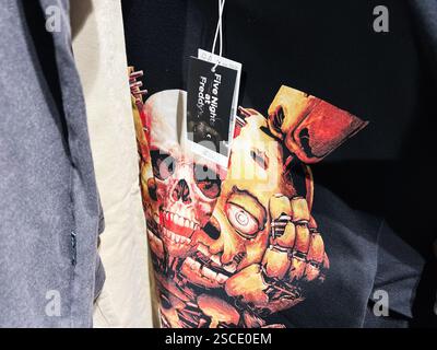 Kyiv, Ukraine - February 05, 2025: Close-up view of a graphic t-shirt featuring a Five Nights at Freddy's theme. Stock Photo