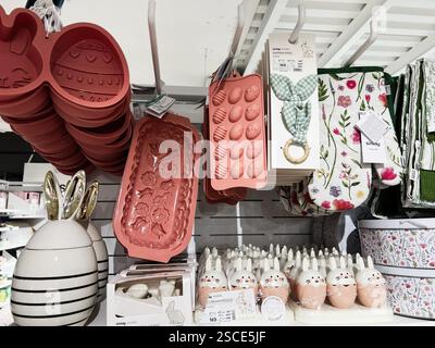 Kyiv, Ukraine - February 05, 2025: Decorative kitchen accessories and products with an Easter theme arranged for sale. Stock Photo