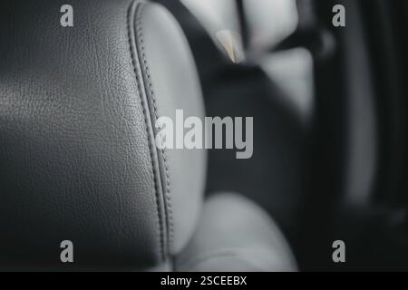 Close-up of gray leather texture on a car seat, emphasizing material quality and comfort Stock Photo