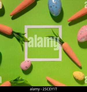Easter pattern made with carrots on bright blue background. Creative minimal holiday concept Stock Photo