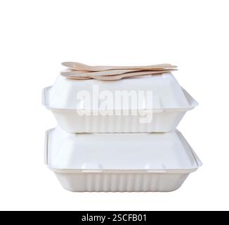 Stack of two biodegradable take out food containers with wooden bamboo cutlery on top isolated cutout on white Stock Photo