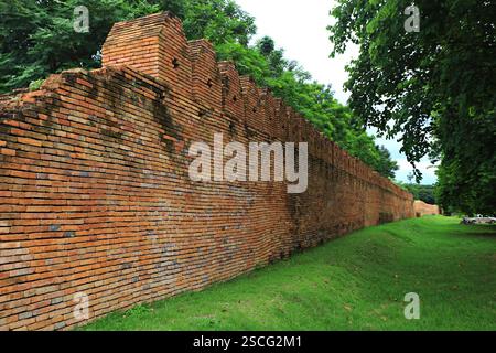 Ancient city wall Built from bricks Lined together to form a high wall for protection in Nan Province, Thailand Stock Photo