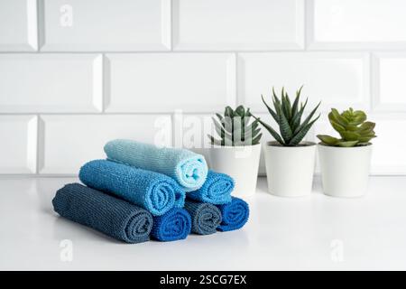 Colorful microfiber towels on a modern kitchen. Kitchen utensils Stock Photo