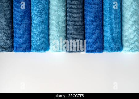 A row of colorful microfiber cloths for housekeeping and cleaning Stock Photo