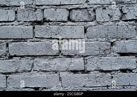 Grey bricked wall texture background wallpaper design desktop Stock Photo