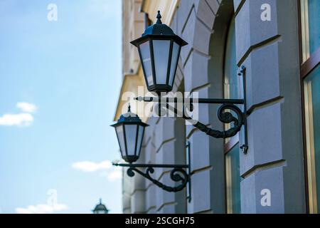 Lanterns on the wall of a building Stock Photo