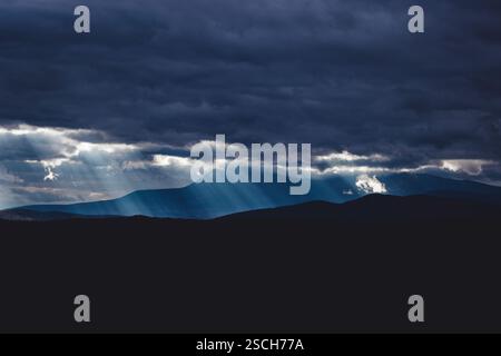 Sunbeams break through clouds over Katahdin, Maine Stock Photo