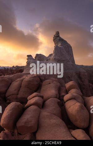 Stunning sandstone formations in Goblin Valley State Park, Utah, under a dramatic sky. The unique rock shapes capture the essence of the desert landsc Stock Photo