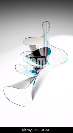 Modern abstract glass sculpture with swirling shapes and reflective surfaces. Subtle rainbow hues on a white background add dynamic visual interest. P Stock Photo