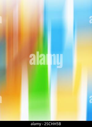 An abstract photograph depicting a canvas of multicolored vertical lines with blurred transitions and soft hues, creating a peaceful and ethereal visu Stock Photo