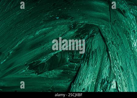 Abstract background with green plaster texture. Seamless background with large brush strokes. Rough stylized texture with space for text. High quality Stock Photo