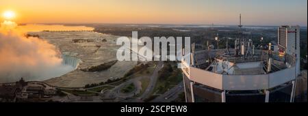 Niagara Falls, Canada - September 15, 2024 : Aerial shot of Niagara falls at sunrise, Large body of water with a waterfall Stock Photo