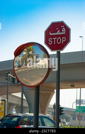 Mirror for security and sign stop, mirror reflecting palm Stock Photo ...
