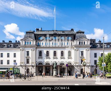 Front view of the Central Station in Stockholm, Sweden, with the statue of Nils Ericson in front of the main entrance, on a sunny summer day. Stock Photo